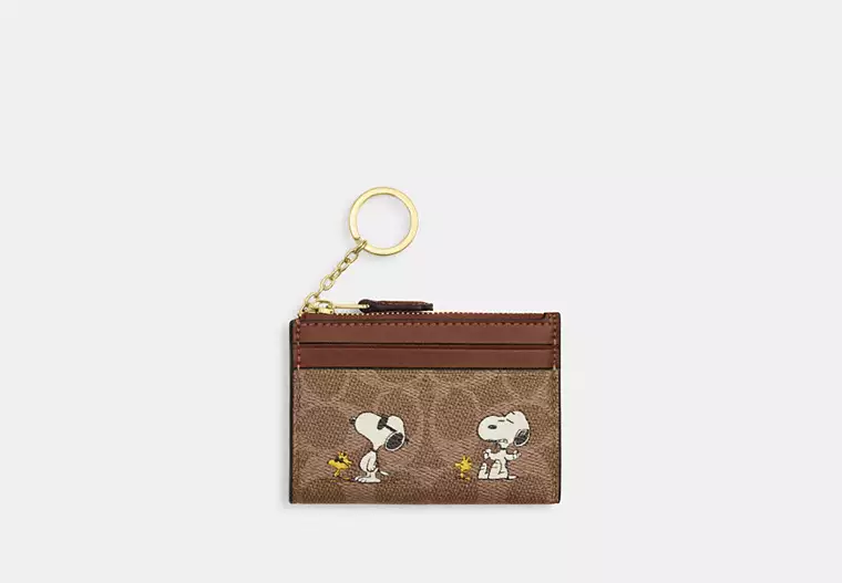 Coach X Peanuts Mini Skinny Id Case In Signature Canvas With Snoopy Print