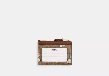 Coach X Peanuts Mini Skinny Id Case In Signature Canvas With Snoopy Print