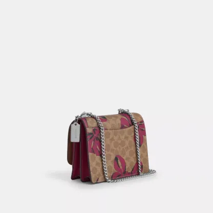 Klare Crossbody Bag In Signature Canvas With Bow Print
