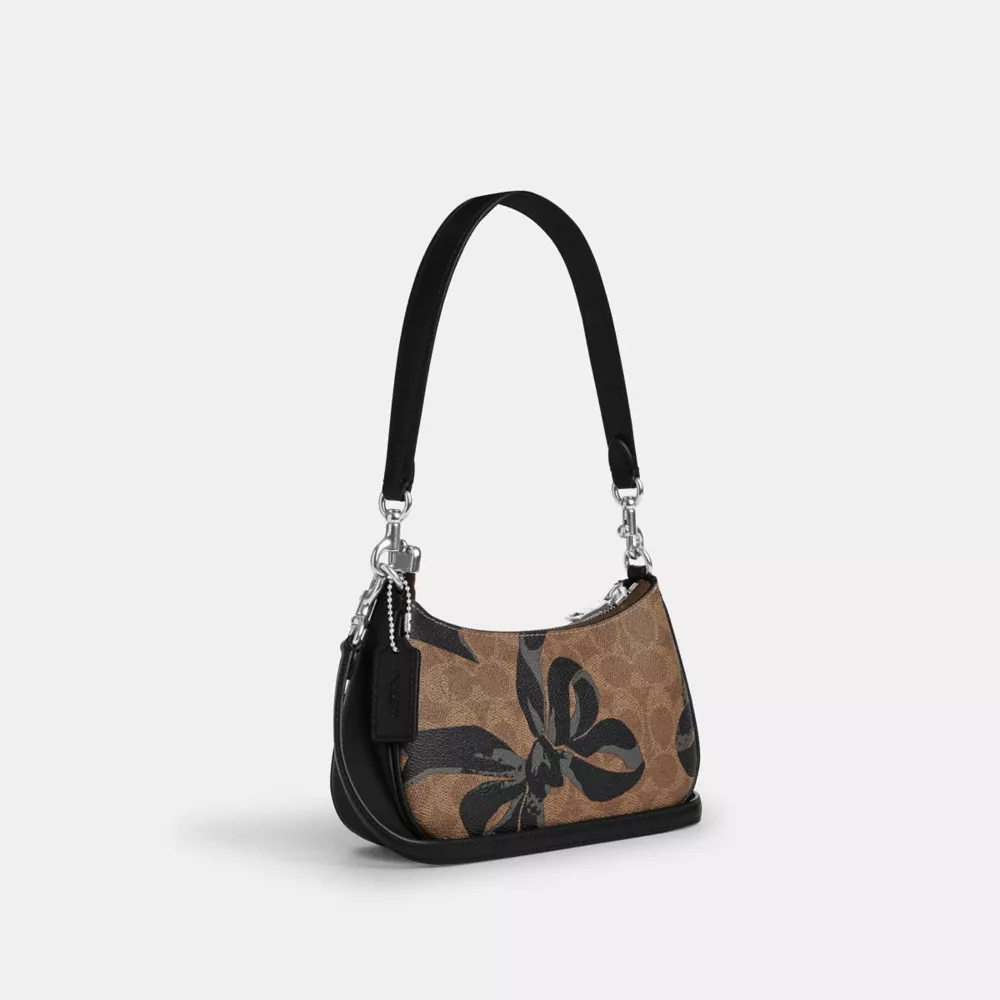 Teri Mini Crossbody Bag In Signature Canvas With Bow Print