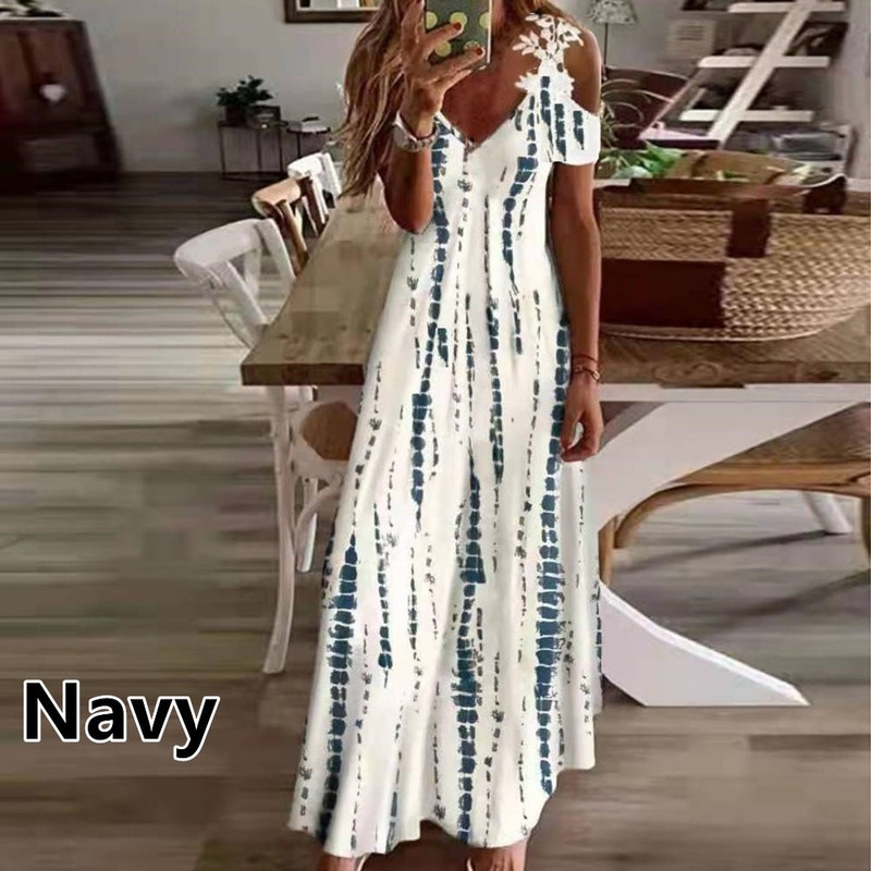 Locker geschnittenes Kleid mit Spitzen-Neckholder und V-Ausschnitt, modischem Print