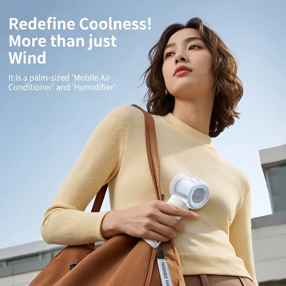 Handheld Mist Fan – Portable, Instant Cooling & Quiet