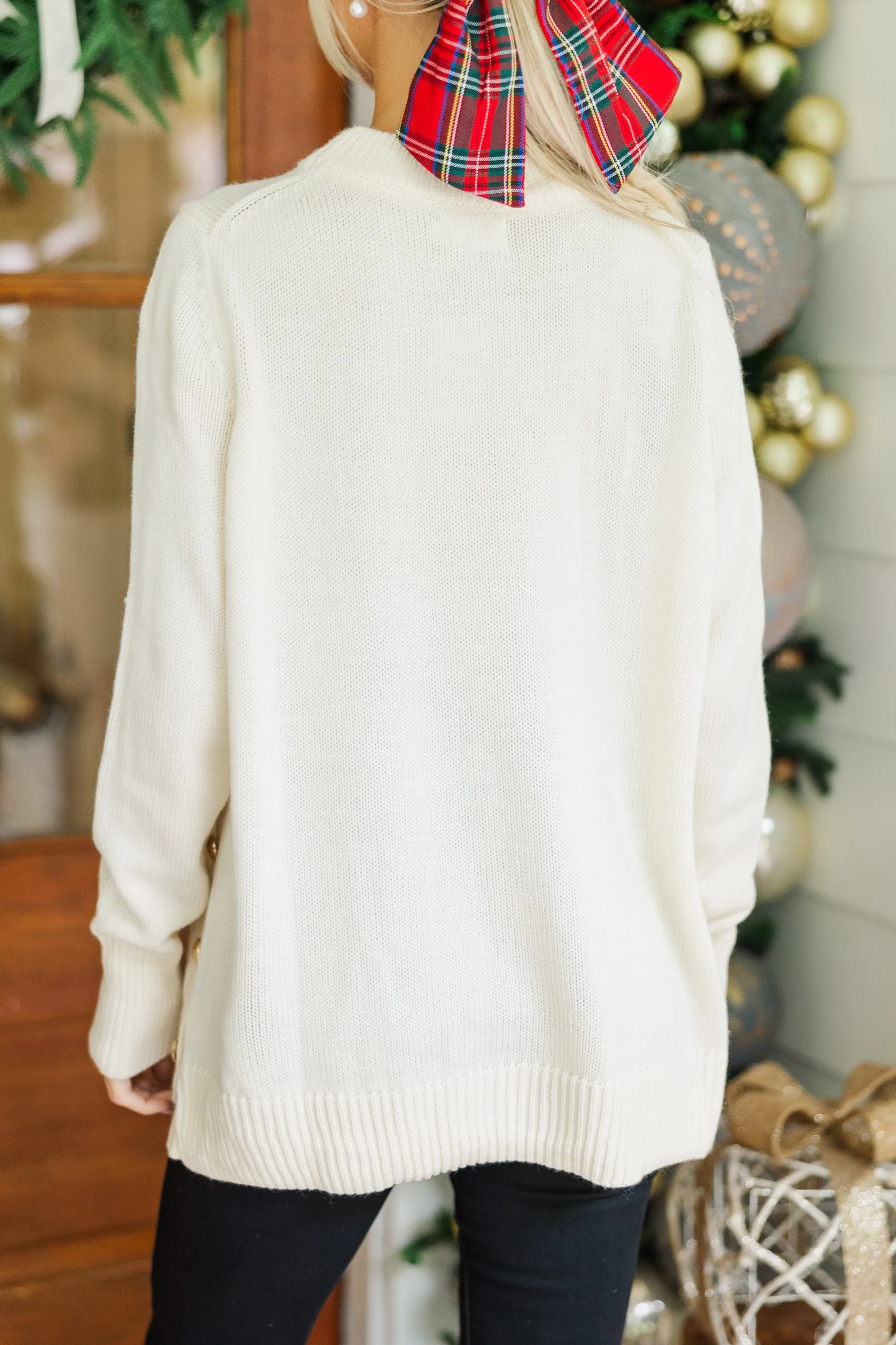 The Slouchy Black Side Button Sweater