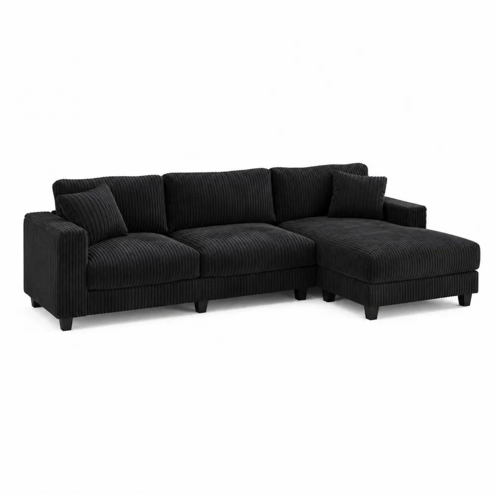 Czarna sofa narożna z szezlongiem sztruksowa