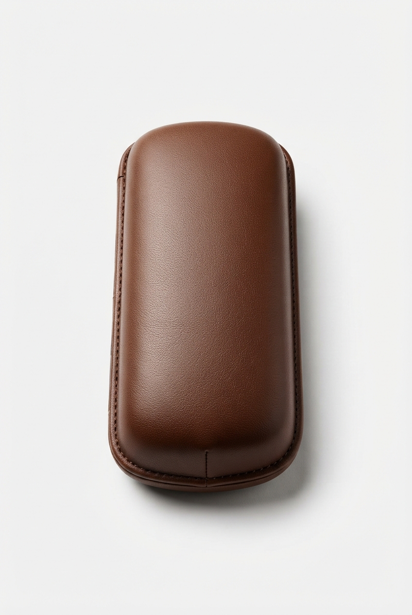 Brown PU leather eyeglasses case closed on neutral background