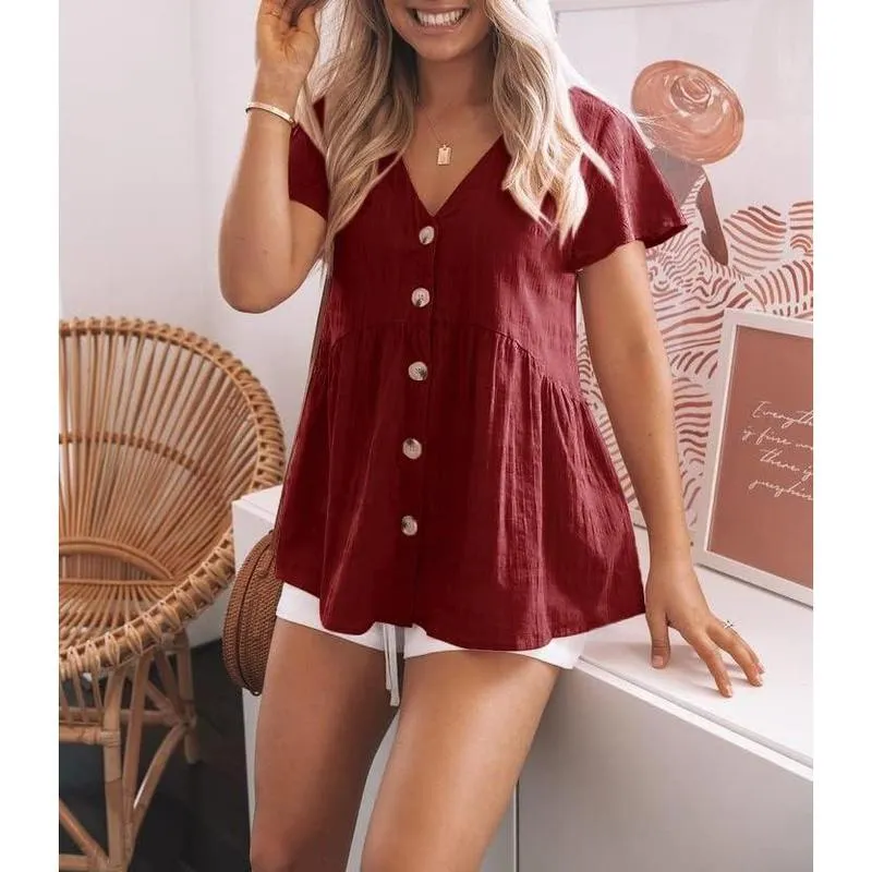 Women's short-sleeved V-neck shirt, button-down, loose and casual babydoll style with ruffled hem.