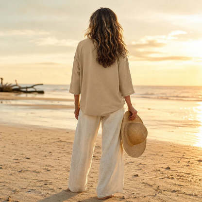 Women's Relaxed V-Neck Linen Blouse with Three-Quarter Sleeves and Curved Hem