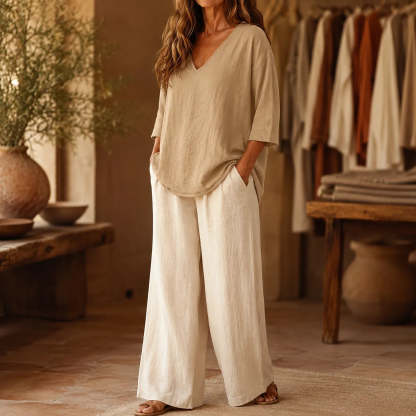 Women's Relaxed V-Neck Linen Blouse with Three-Quarter Sleeves and Curved Hem