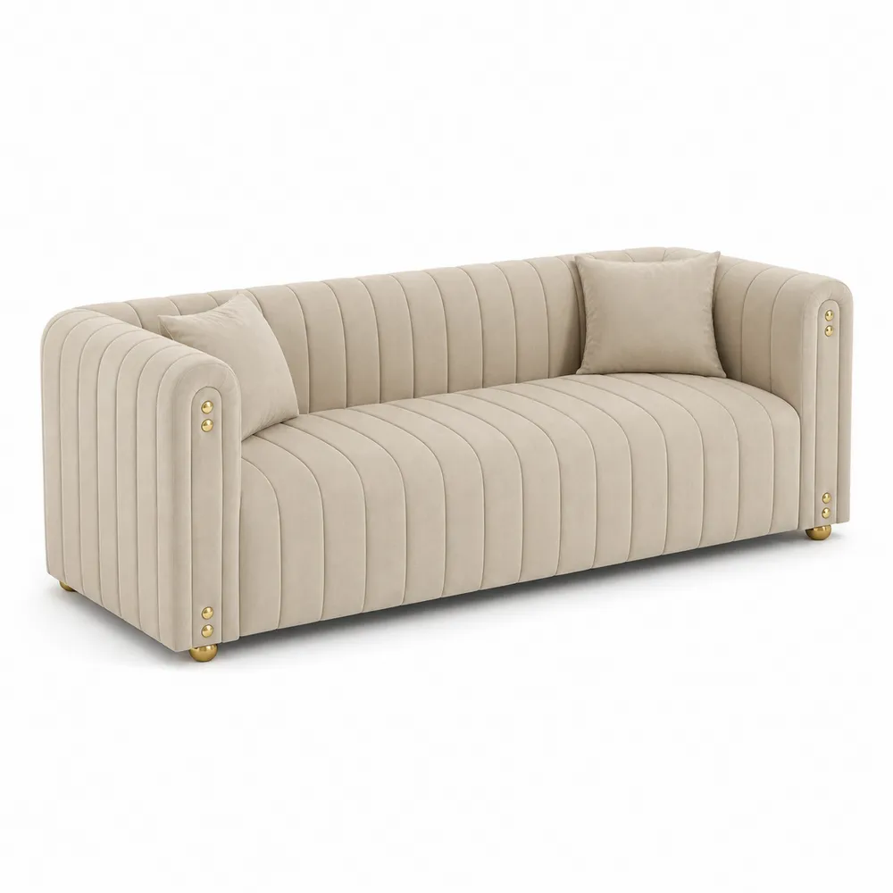 Divano in velluto beige con bottoni decorativi