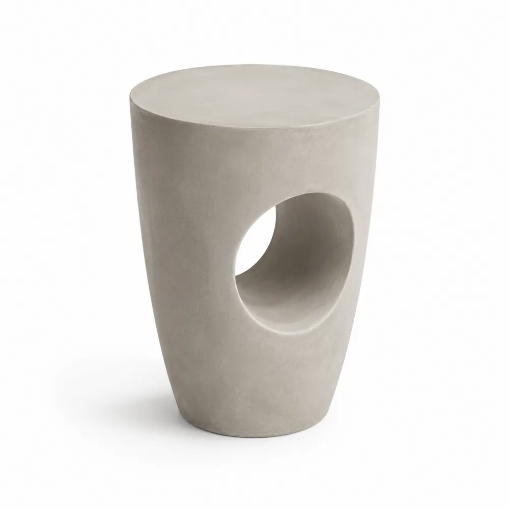 Tavolino Rotondo in Cemento Grigio con Foro Decorativo