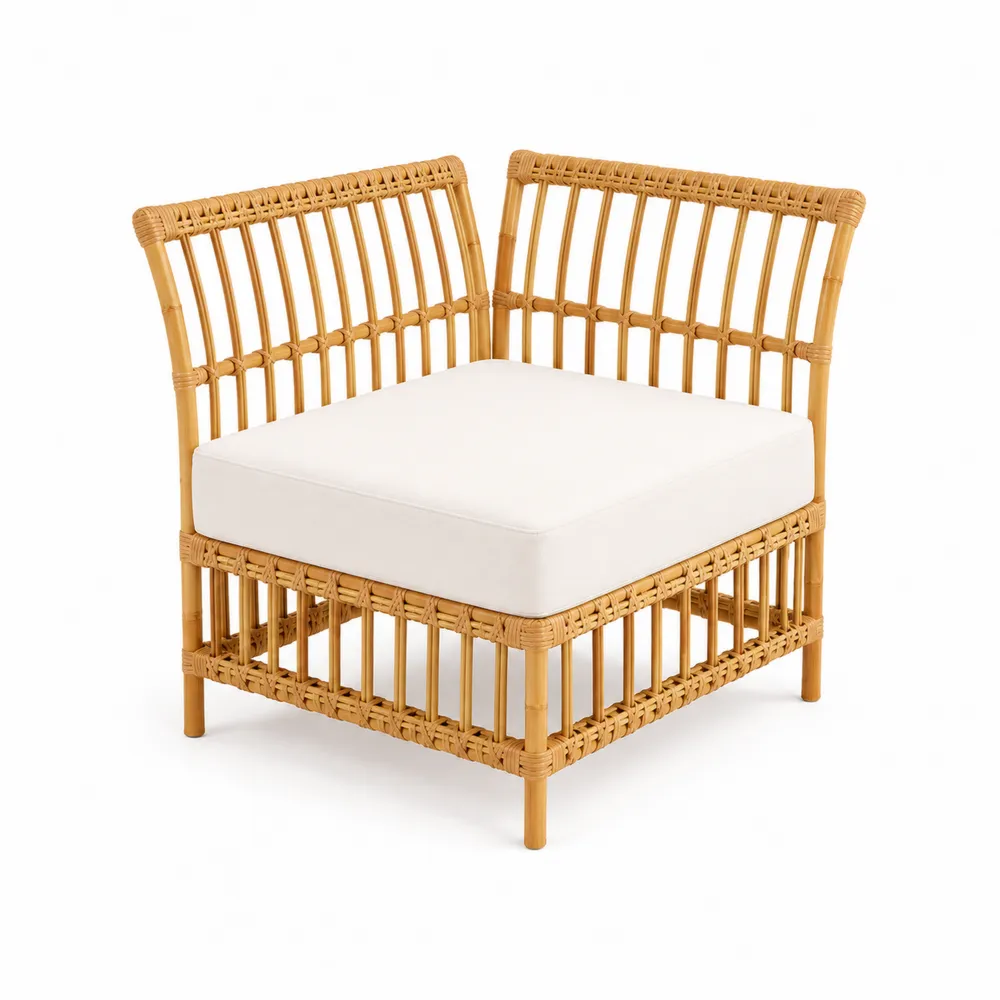 Poltrona ad angolo in rattan con cuscino bianco