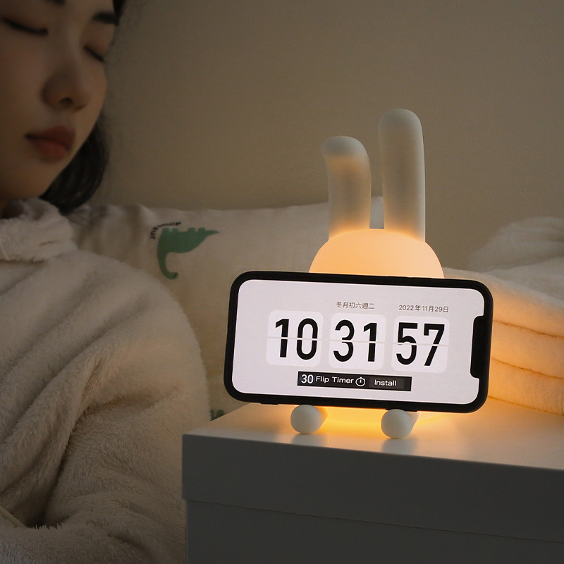 Image of Lopunny Night Light glowing softly on a bedside table.
