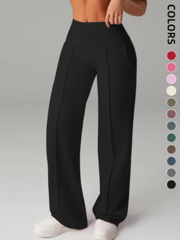 Pantalones de mujer de tiro medio, cintura elástica y pernera ancha; estilo deportivo casual, cómodos bolsillos laterales; prenda versátil para primavera y otoño; ideales para el día a día; moda femenina.