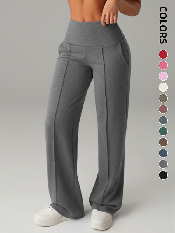Pantalones de mujer de tiro medio, cintura elástica y pernera ancha; estilo deportivo casual, cómodos bolsillos laterales; prenda versátil para primavera y otoño; ideales para el día a día; moda femenina.