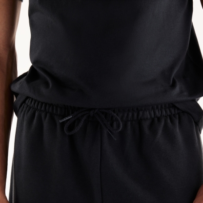 Tyler is wearing size M and is 6'/182.8cm. Chest: 36.25"/92cm, Waist: 29.5"/75cm, Hips: 37"/94cm