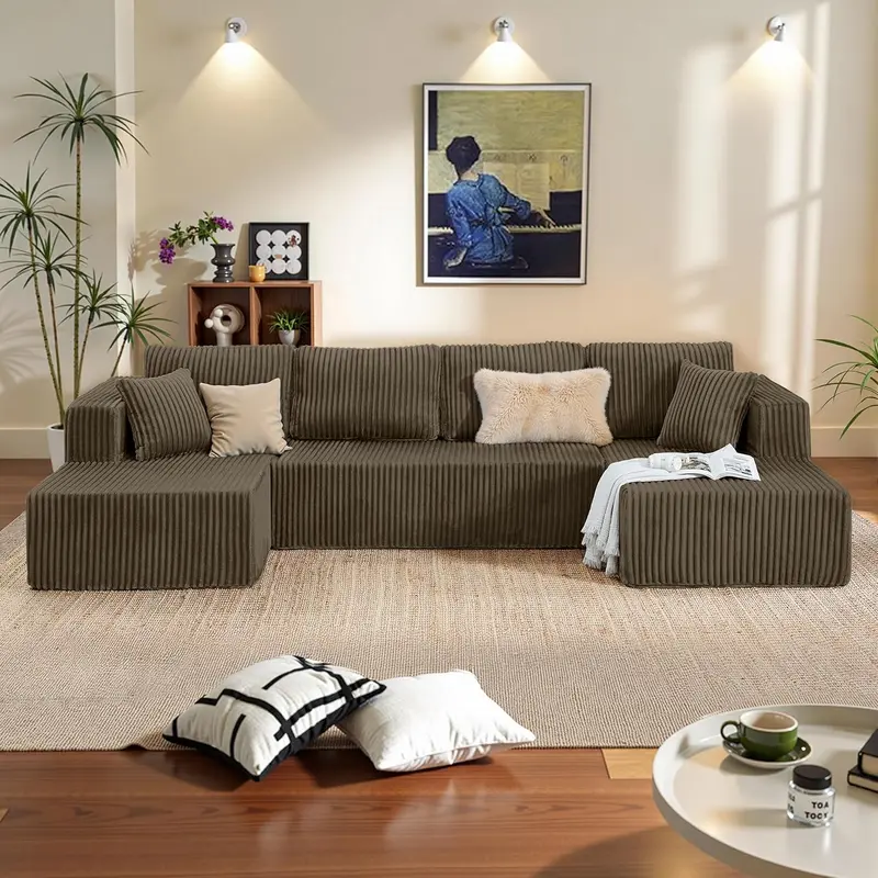 Niccae 132-Inch U-Shaped Memory Foam Sectional Sofa — An oversized modular design offering "cloud-like" comfort; features deep seating and compressed corduroy fabric, combining space-saving capabilities with a convertible sleeper function.