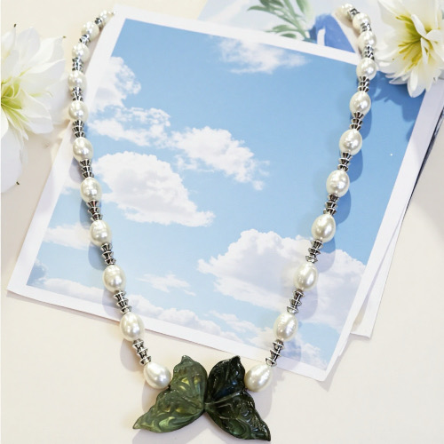 Butterfly’s Glimmer & Pearls-- AAAAA+ 6*8mm Natural freshwater pearl necklace with 21*37 butterfly labradorite