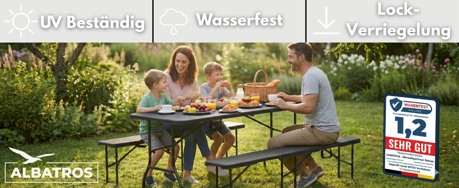 People gathered around outdoor table enjoying a summer garden party