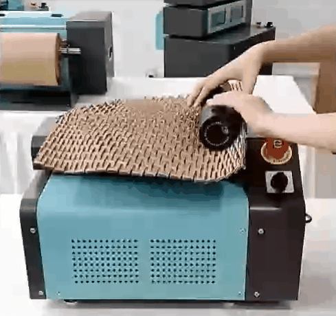 Feeding kraft paper into cushioning machine