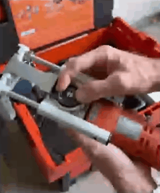 Plunge base and dust port kit on oscillating multi-tool in action