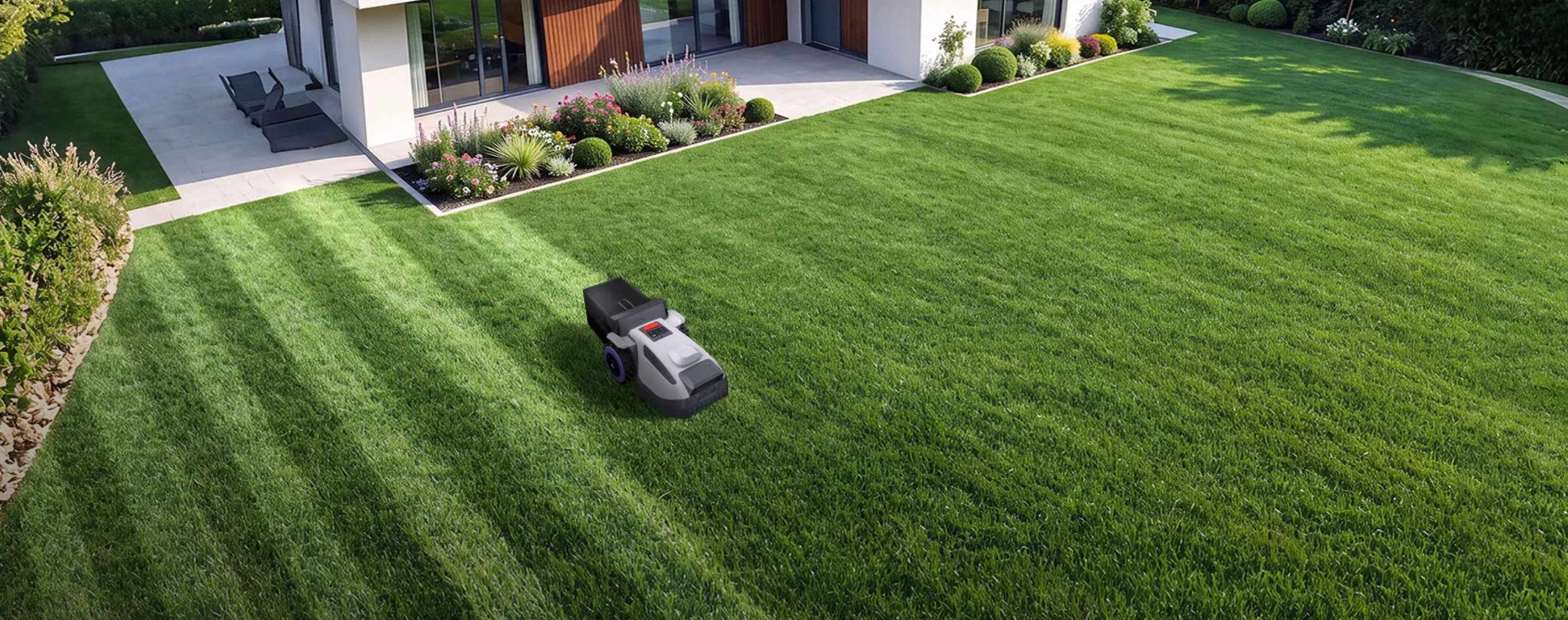 Robotic lawn mower following planned mowing routes on a green lawn