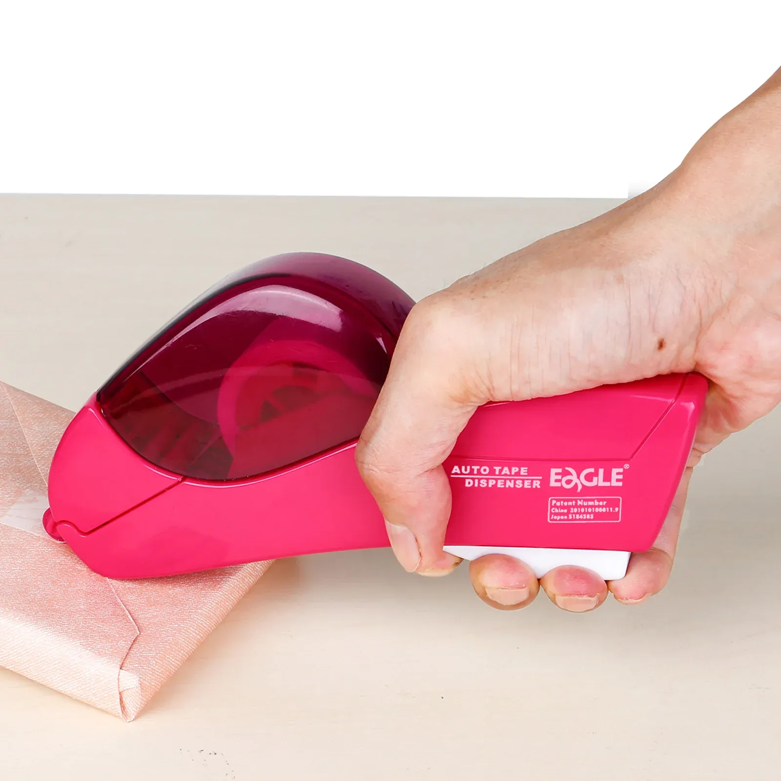 One handed tape dispensing