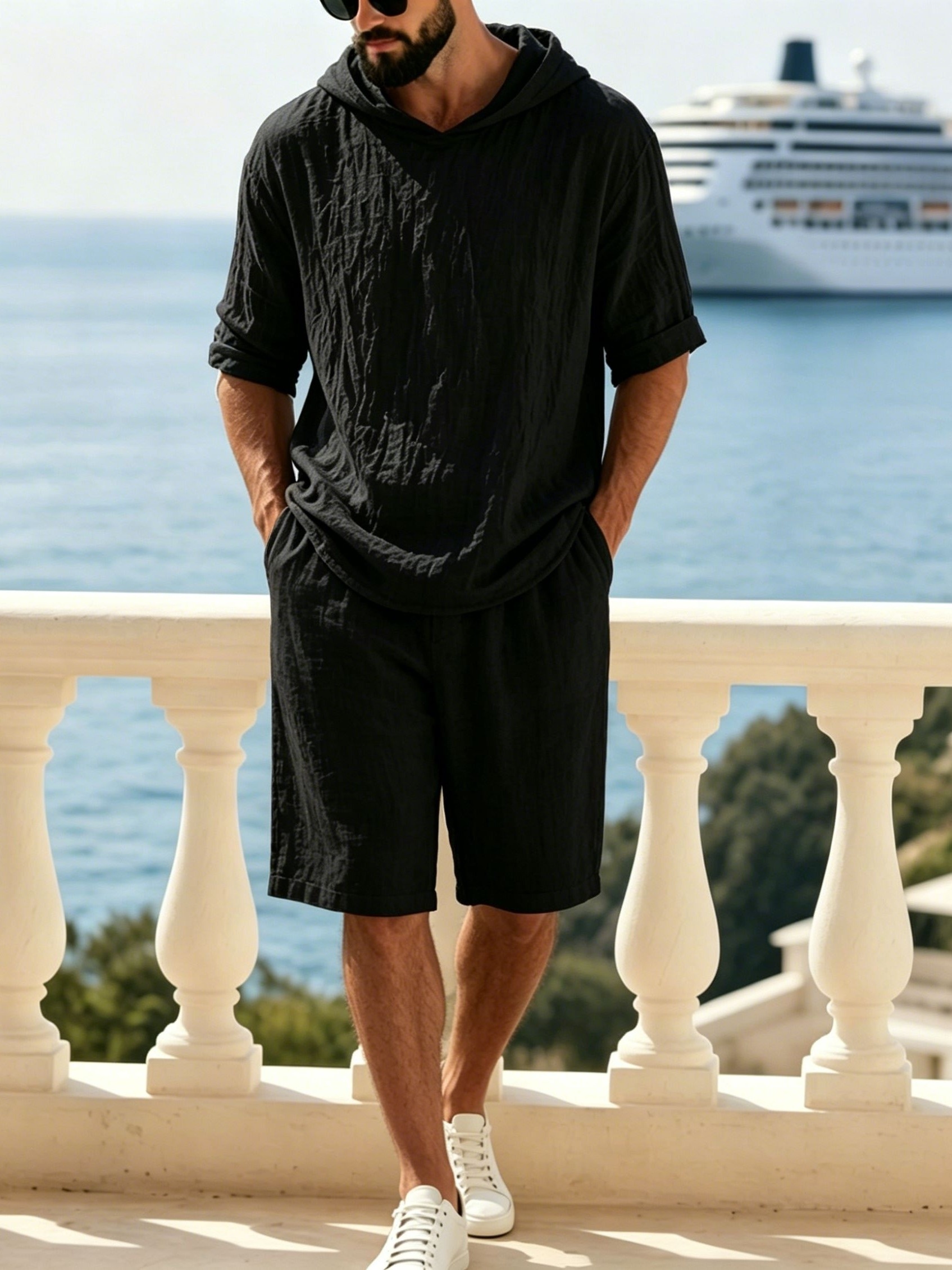 Men’s linen hooded two-piece set—a short-sleeved hooded top paired with elastic-waist shorts—perfect for summer wear.