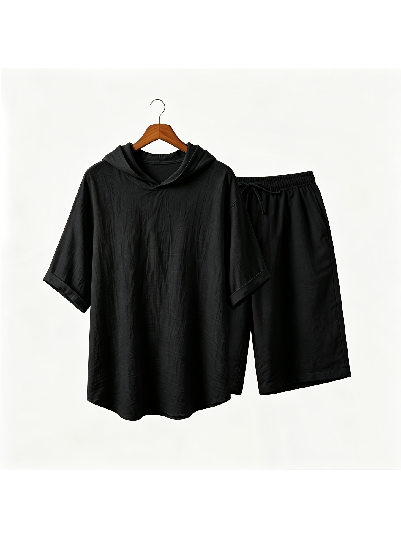 Men’s linen hooded two-piece set—a short-sleeved hooded top paired with elastic-waist shorts—perfect for summer wear.