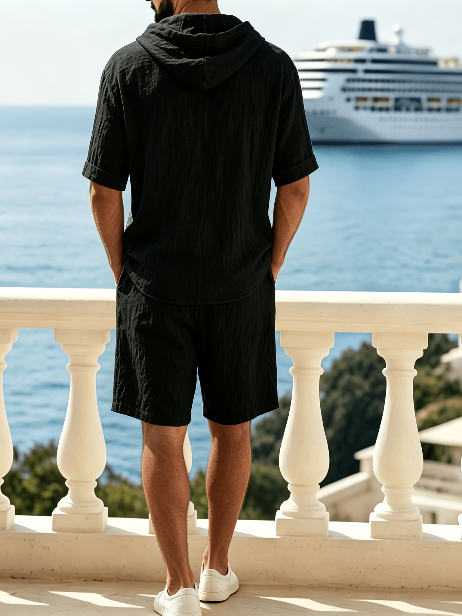 Men’s linen hooded two-piece set—a short-sleeved hooded top paired with elastic-waist shorts—perfect for summer wear.
