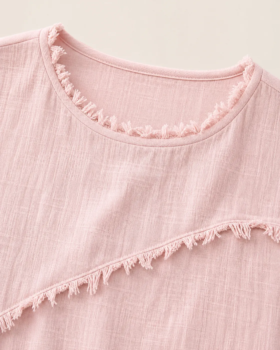 Fringed Neckline and Fabric Detail