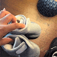 Baby bootie opening and fastening detail