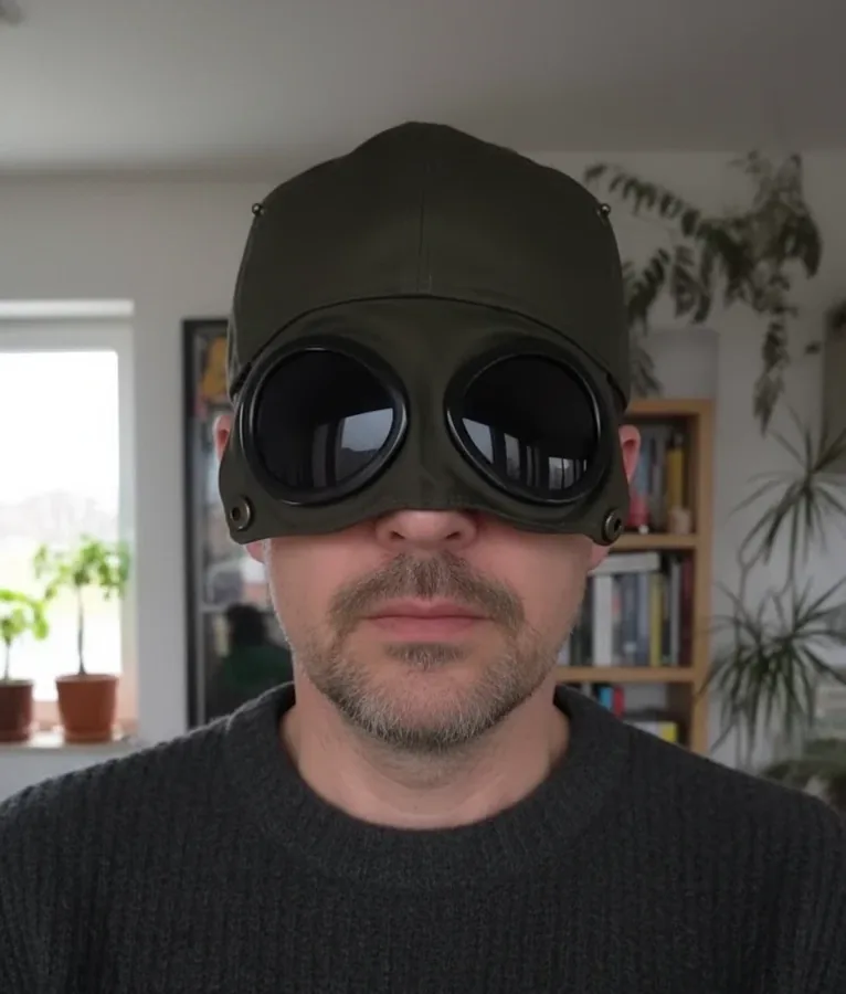 Customer wearing dark goggle cap