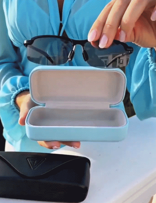 GIF placeholder: sunglasses lens color changing from clear to dark under sunlight