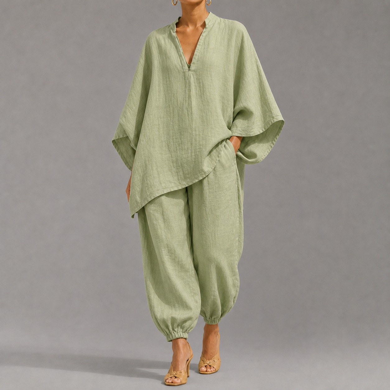Women's loose, casual summer two-piece set featuring a notched-collar, batwing-sleeve top and trousers; lightweight and comfortable.