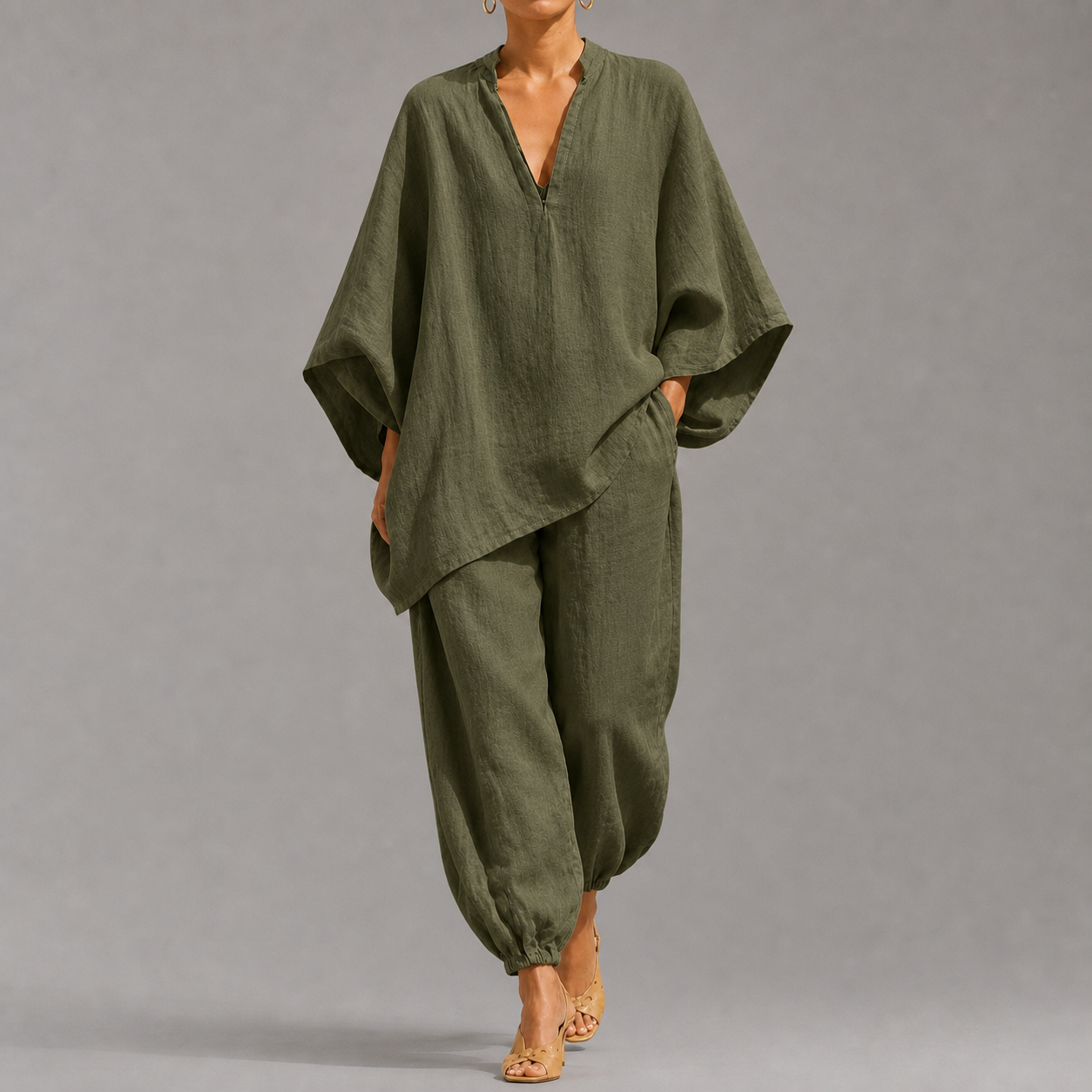 Women's loose, casual summer two-piece set featuring a notched-collar, batwing-sleeve top and trousers; lightweight and comfortable.