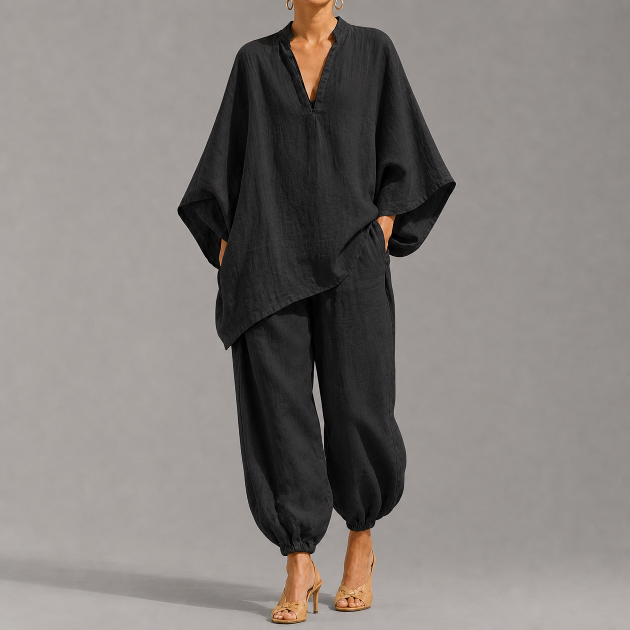 Women's loose, casual summer two-piece set featuring a notched-collar, batwing-sleeve top and trousers; lightweight and comfortable.