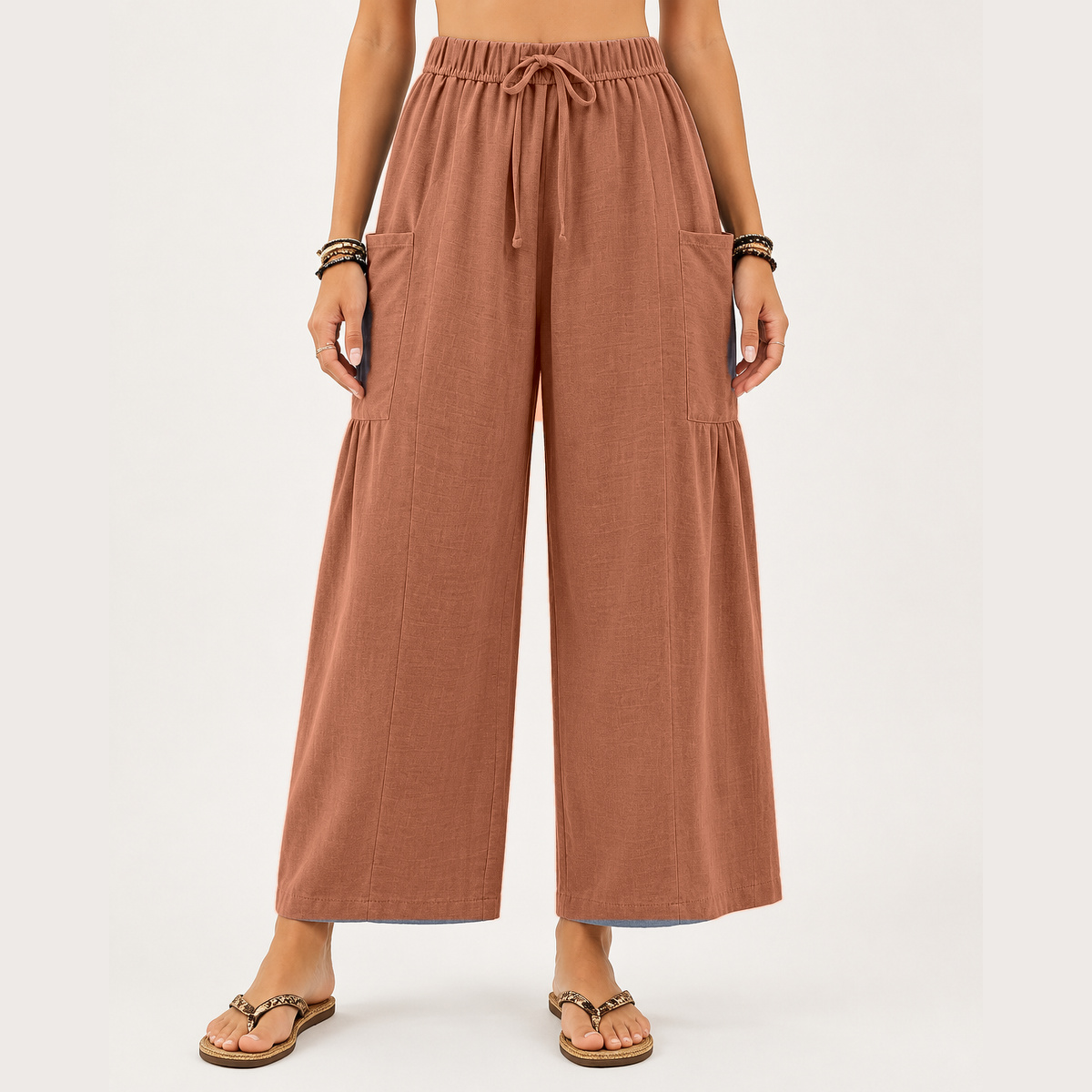 Women's wide-leg shorts featuring a drawstring design and pockets.