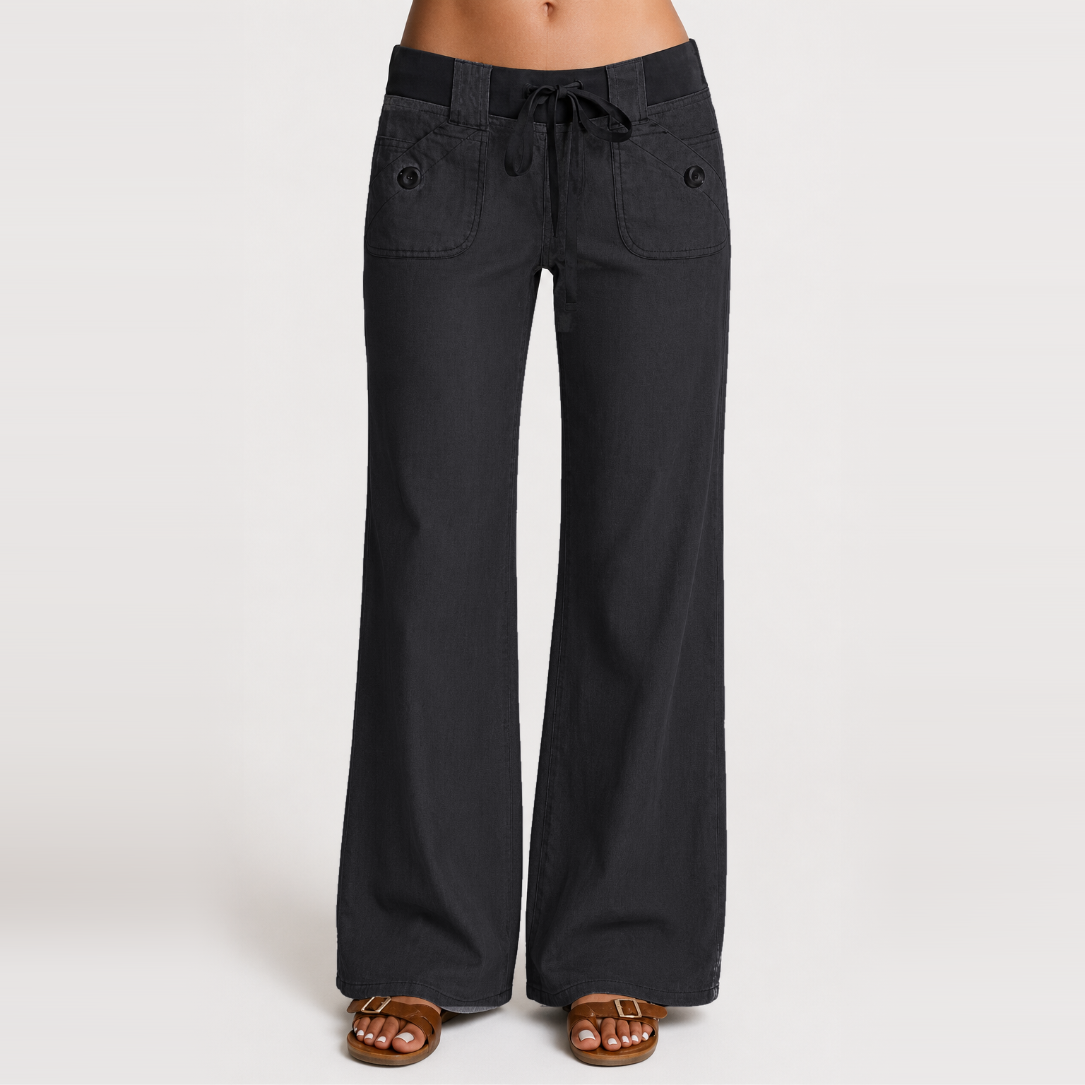 Women's low-rise wide-leg cargo pants featuring flap pockets and Y2K-style bow ties