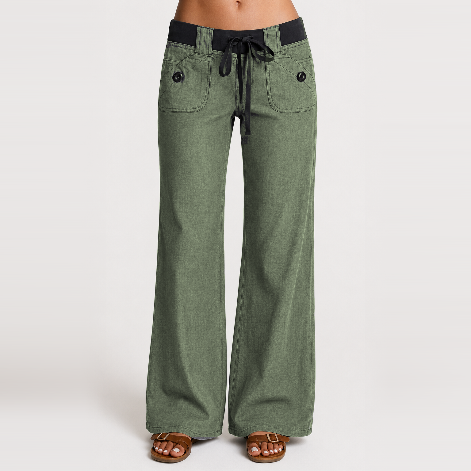 Women's low-rise wide-leg cargo pants featuring flap pockets and Y2K-style bow ties