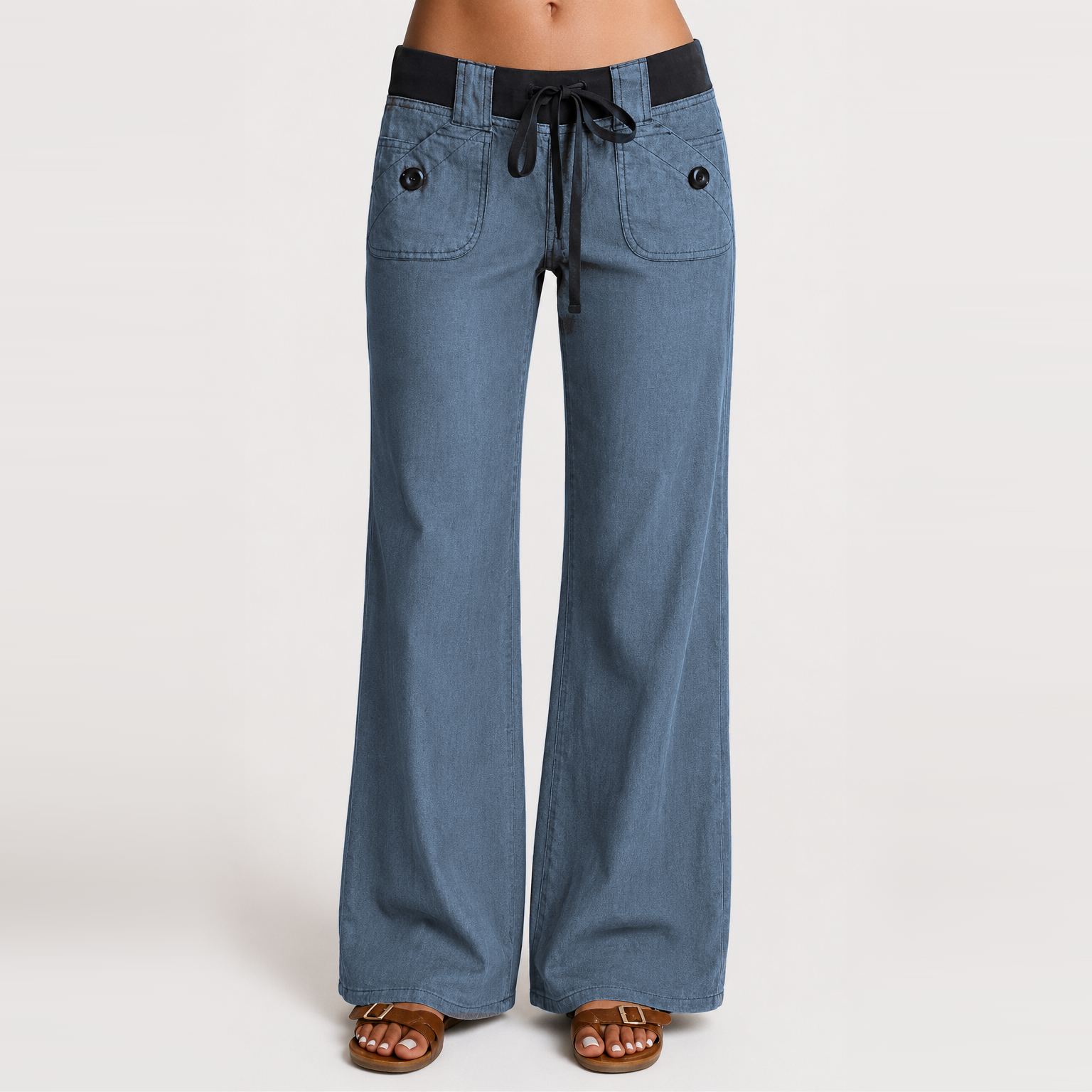 Women's low-rise wide-leg cargo pants featuring flap pockets and Y2K-style bow ties