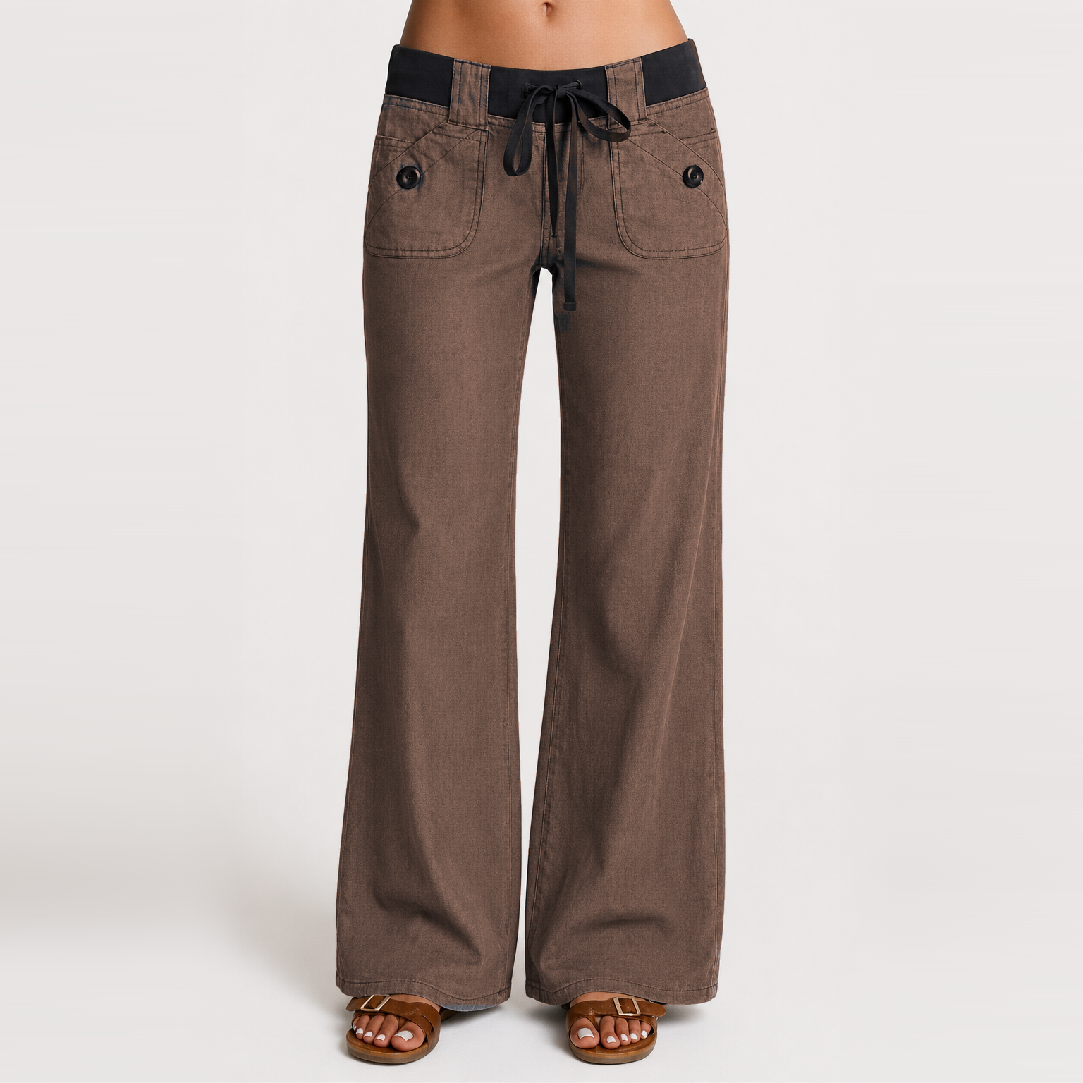 Women's low-rise wide-leg cargo pants featuring flap pockets and Y2K-style bow ties
