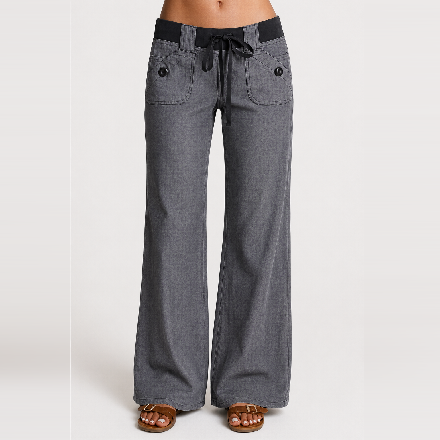 Women's low-rise wide-leg cargo pants featuring flap pockets and Y2K-style bow ties