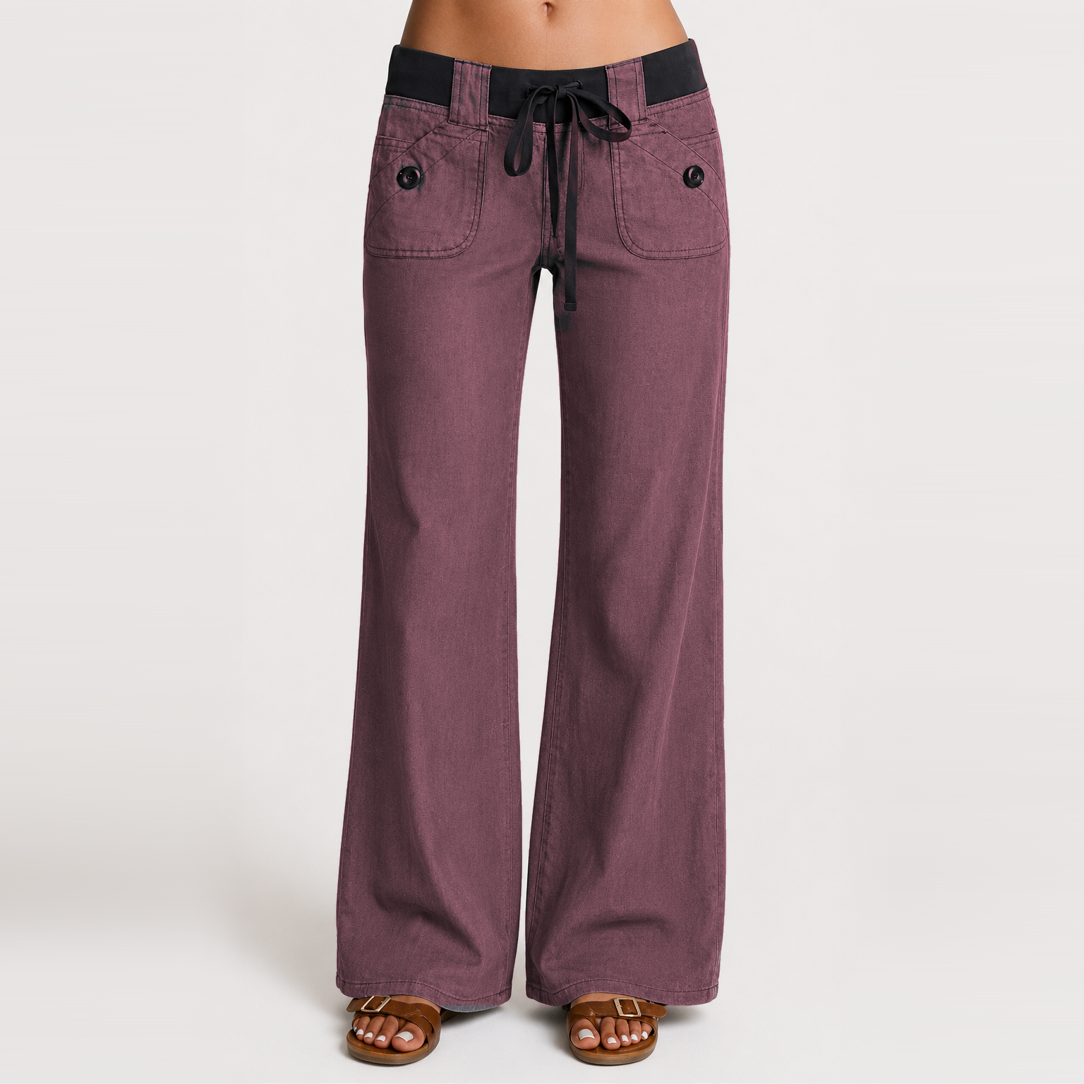 Women's low-rise wide-leg cargo pants featuring flap pockets and Y2K-style bow ties