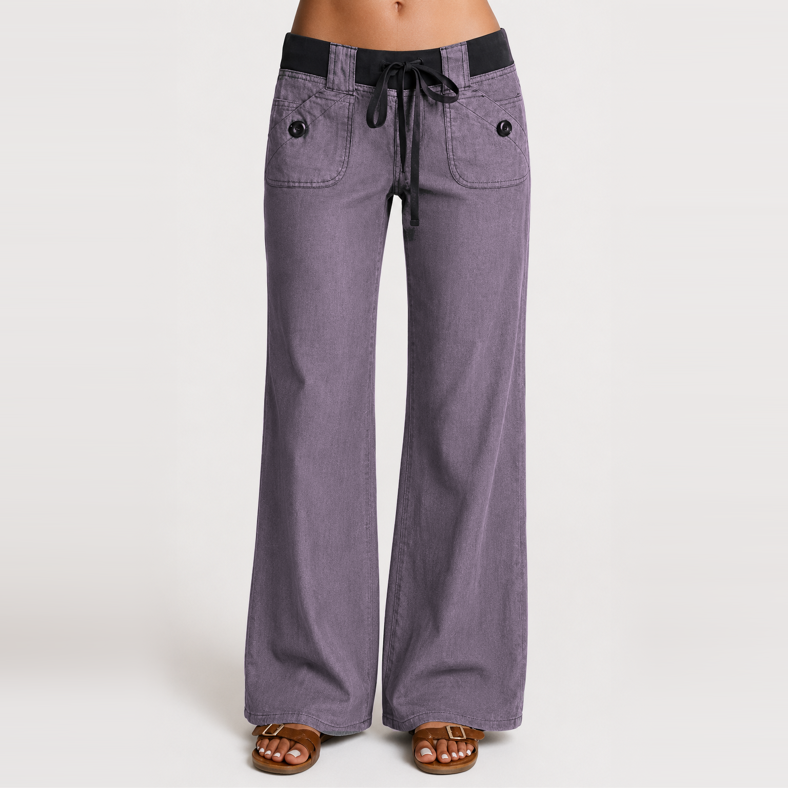 Women's low-rise wide-leg cargo pants featuring flap pockets and Y2K-style bow ties
