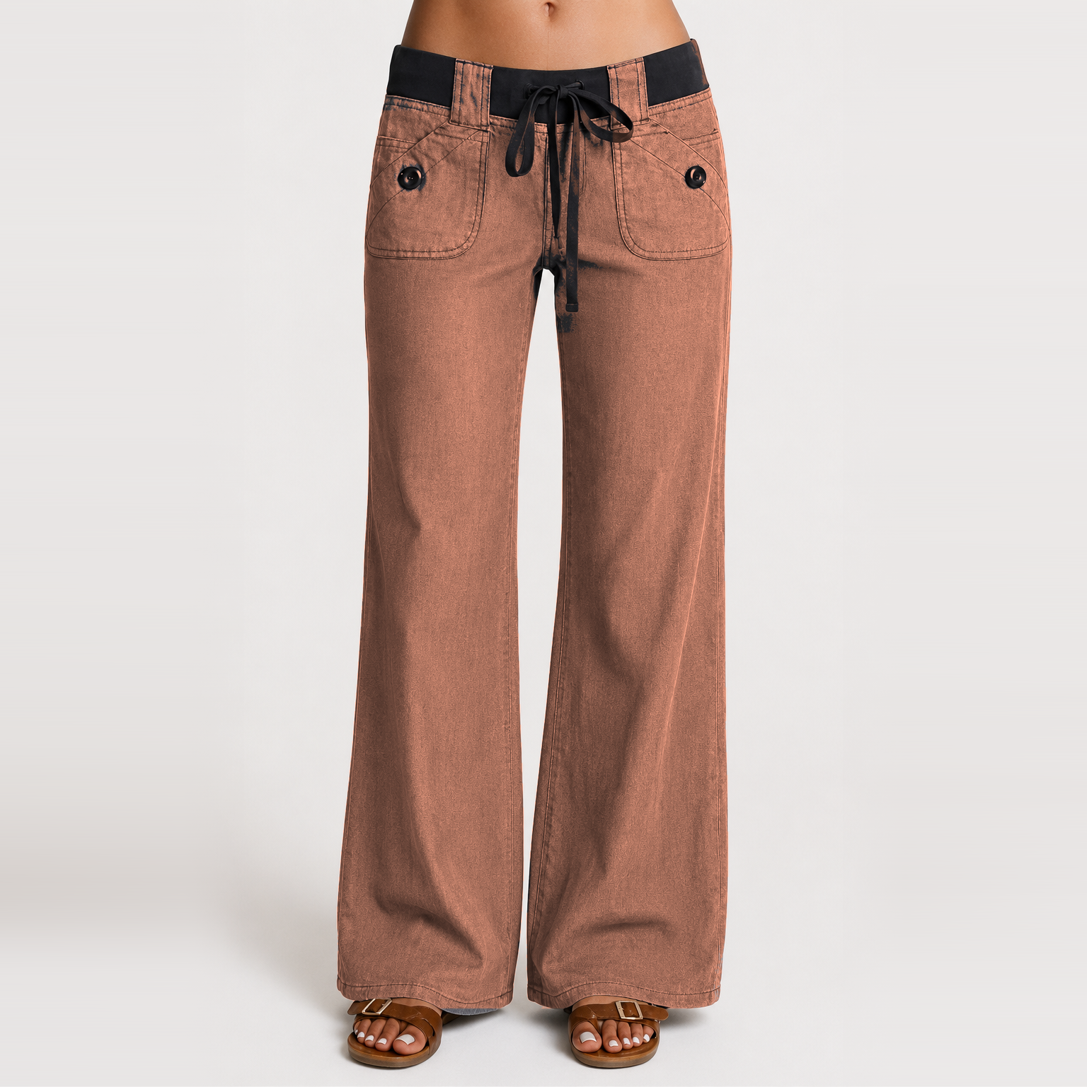 Women's low-rise wide-leg cargo pants featuring flap pockets and Y2K-style bow ties