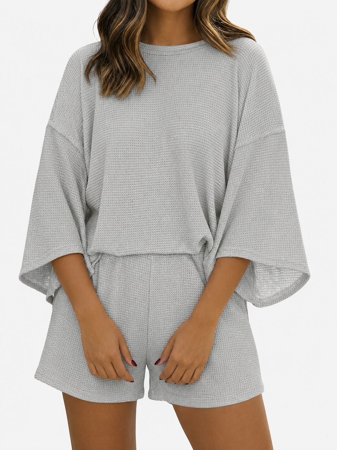 Women's two-piece shorts set with three-quarter sleeve T-shirt
