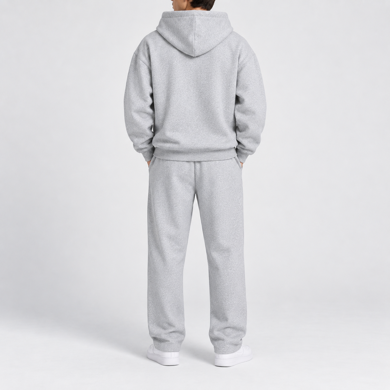 Men's solid-color two-piece casual sportswear set featuring a regular-fit, drop-shoulder, half-zip hoodie.