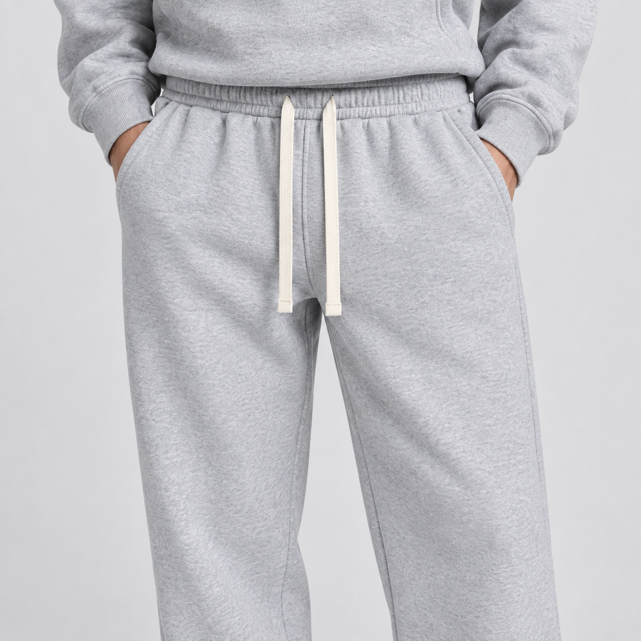 Men's solid-color two-piece casual sportswear set featuring a regular-fit, drop-shoulder, half-zip hoodie.