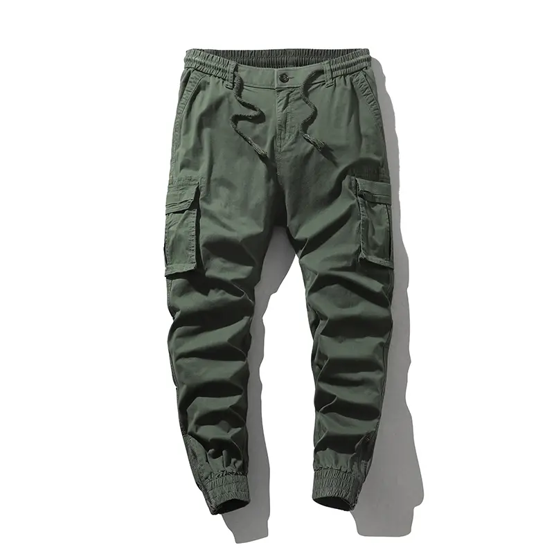 Stylish solid-color cargo pants featuring an elastic drawstring design, multiple pockets, and multiple flap details