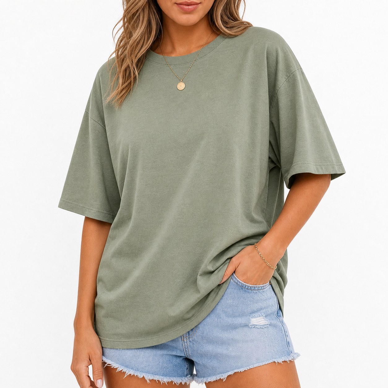 Half-face model wearing oversized crewneck T-shirt